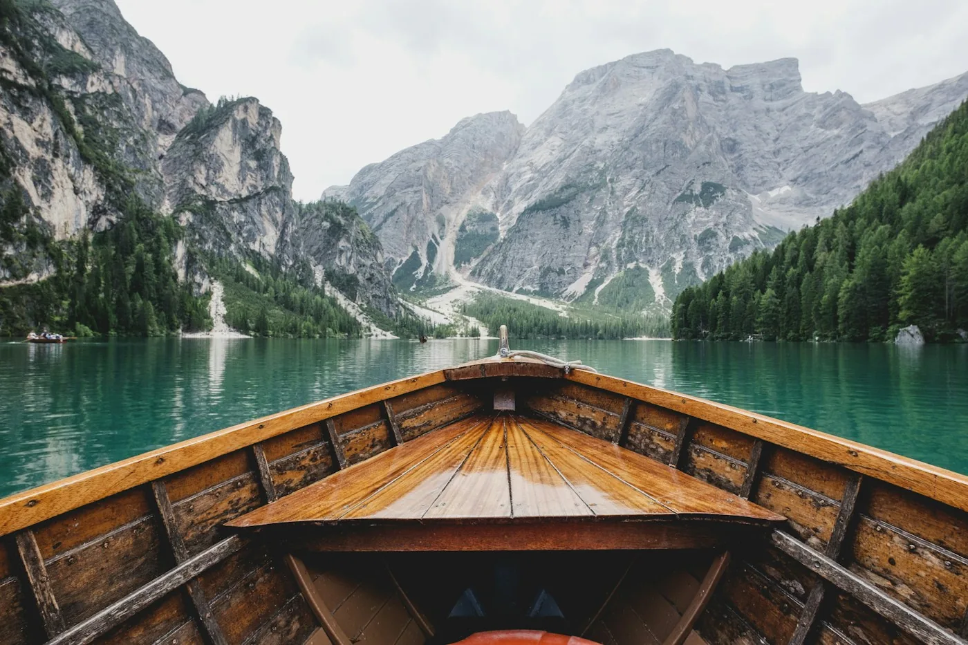 A rowboat on a mountain lake